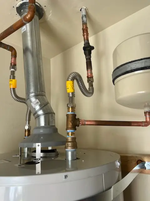 Water heater installation and plumbing repair in Norwood